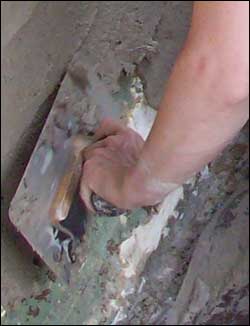 plastering a wall